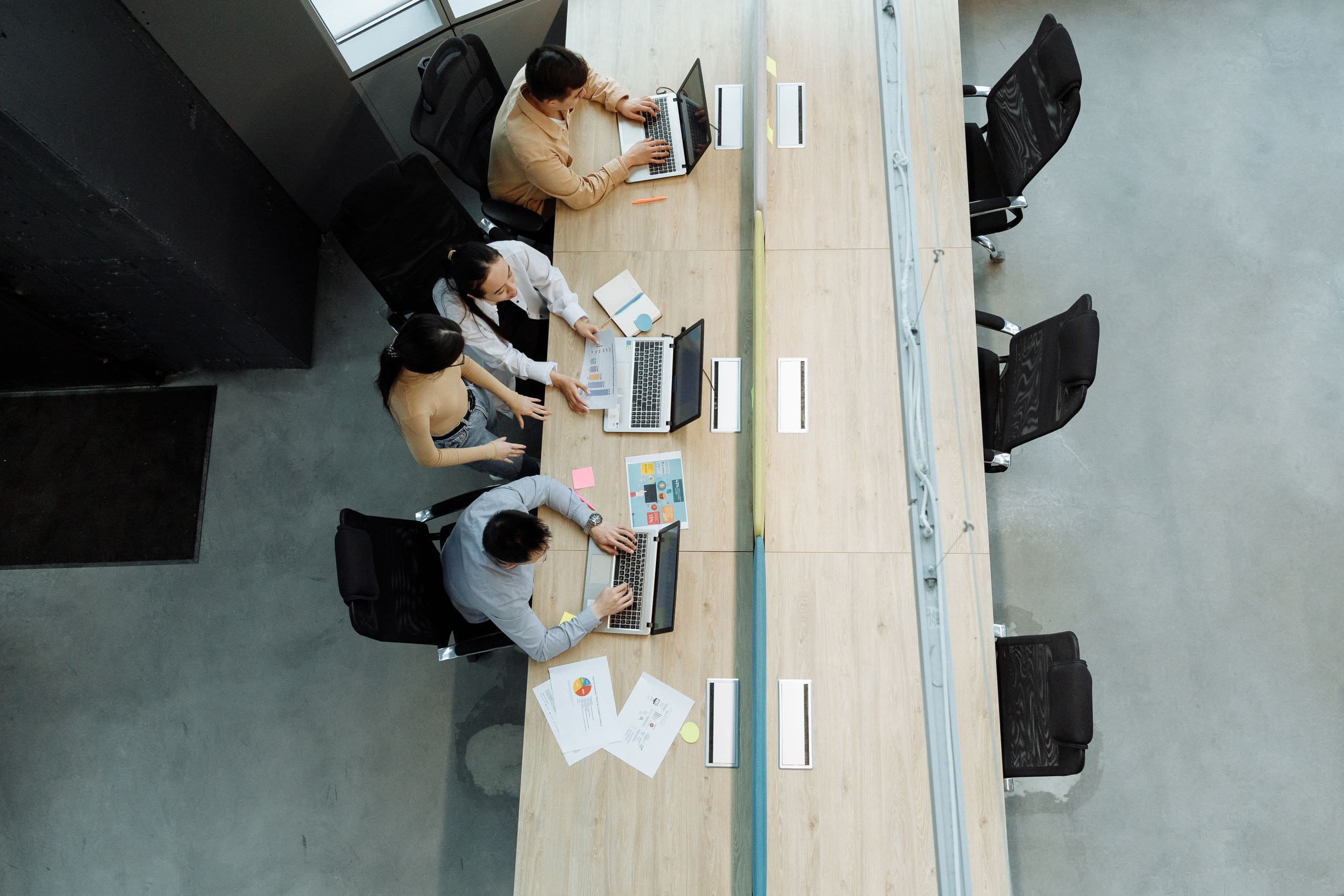 The JULY Marketing floor in full swing, dozens of strategists, designers, and producers at work in warm daylight